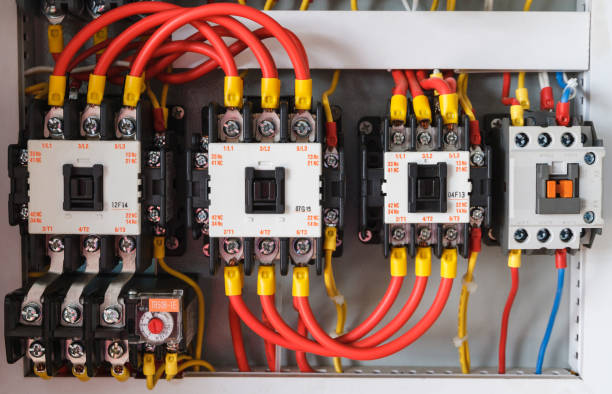 istock Close-up electrical wiring with fuses and contactors. 929598212