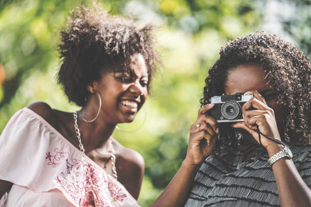 istock Friends Having Fun with Analogue/Retro Camera 929602488