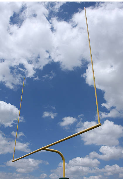 istock American Football Goal Posts Amongst a Cloudy Sky 92960573