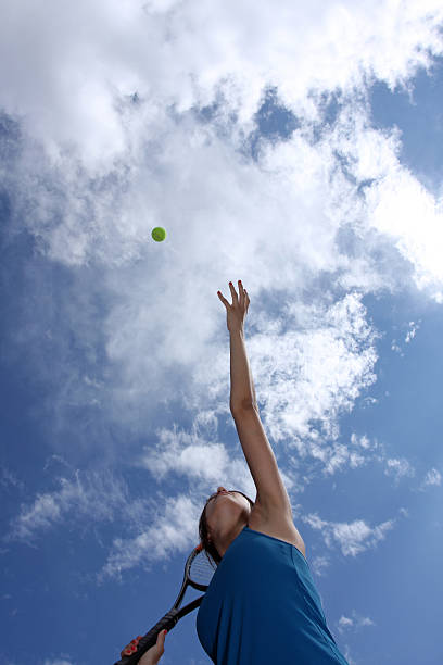 istock Beneath View of a Tennis Player Serving 92960579