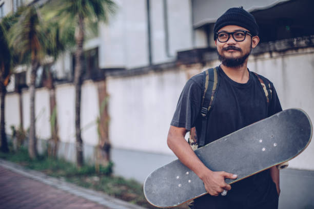 istock Guy with skateboard outdoors 929605970