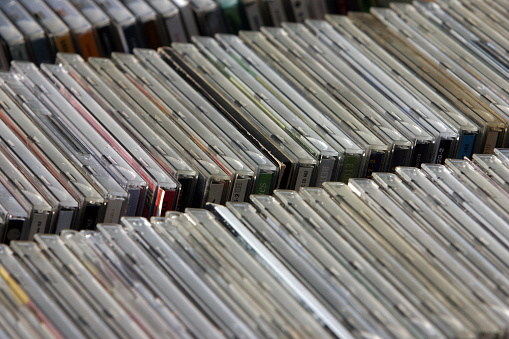 cd covers in a rack (focus in on the middle of the image,rest is out of focus)