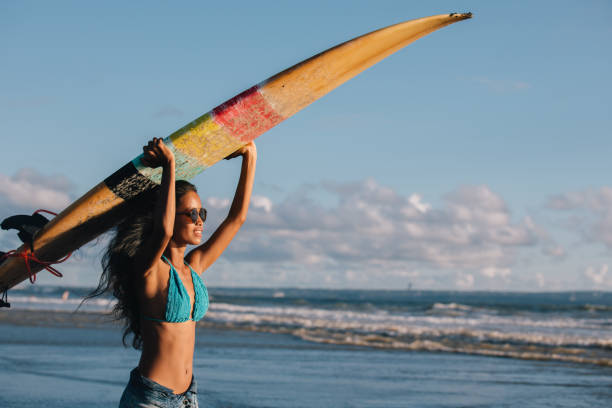 istock Girl in surfer paradise 929610062