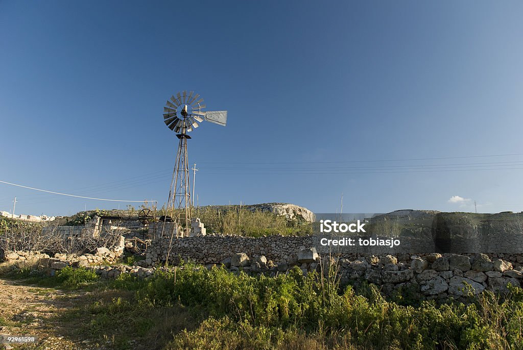 Molino de viento - Foto de stock de Aerogenerador libre de derechos