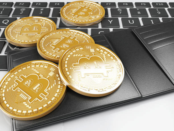 istock 3d Pile of bitcoin gold coins on a computer keyboard 929619916