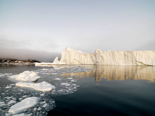 istock Arctic Icebergs on Arctic Ocean at sunset in Greenland 929624514