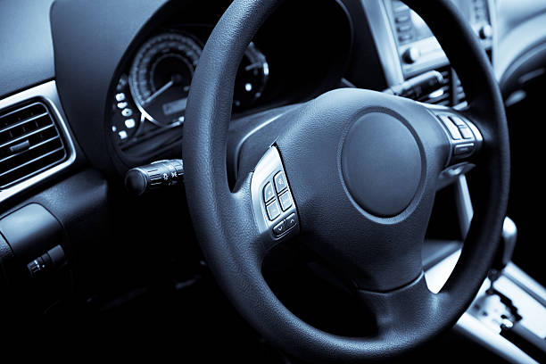 istock New car showing accessible controls on the steering wheel  92963164