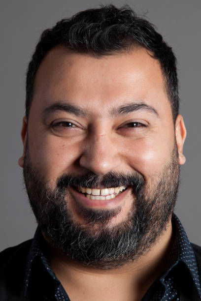 istock laughing portrait of a bearded man 929633214