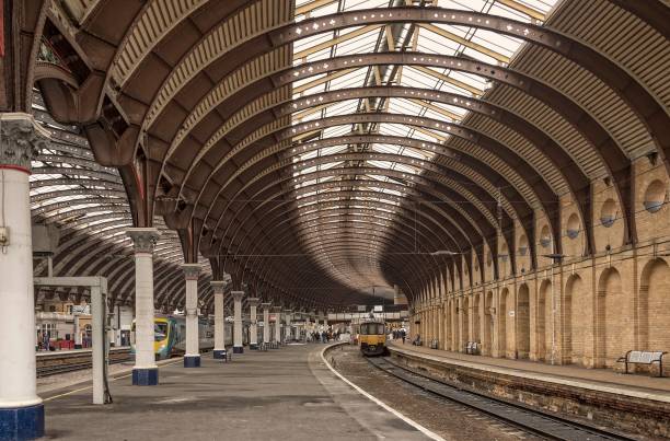 istock Ornate 19th Century curving roof over a railway platform. 929639530
