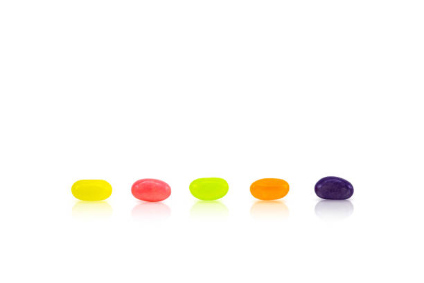 istock Colorful Candies Arranged Over White Background 929642162