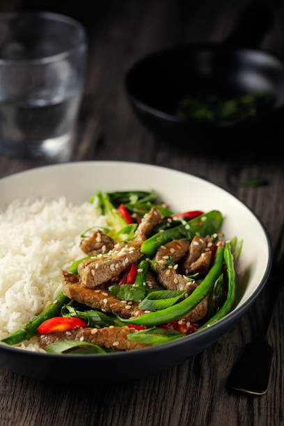 istock Oriental beef stir fry with basmati rice 929645250