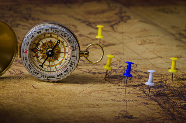 istock Close-Up Of Navigational Compass On Map 929645926