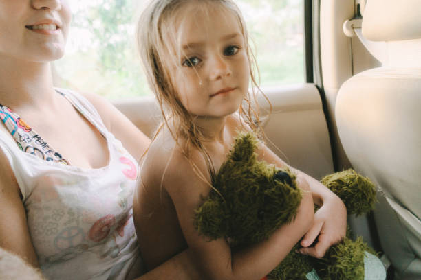 Why kids love stuffed animals. Kid little girl play with soft toy teddy bear on pink background. Toy every child dreaming. Happy childhood concept. Child small girl playful hold teddy bear plush toy.