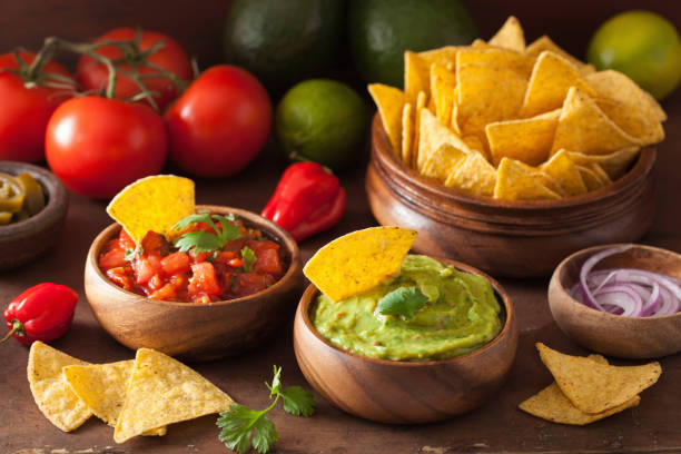istock mexican guacamole and salsa dip, nachos tortilla chips 929659682