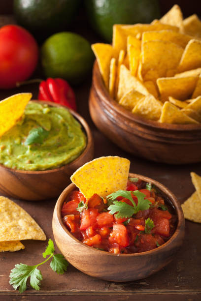 istock mexican guacamole and salsa dip, nachos tortilla chips 929660872