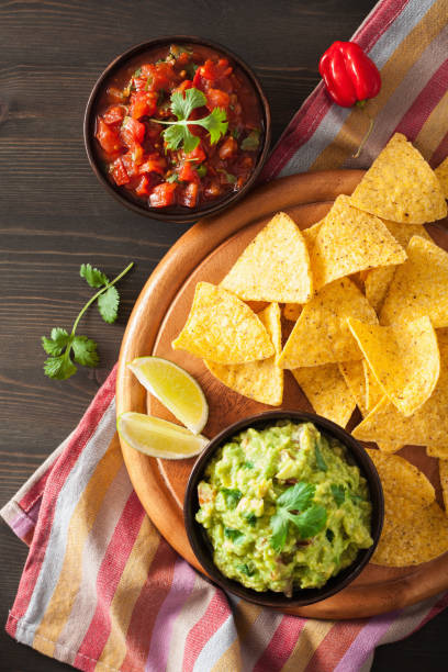 istock mexican guacamole and salsa dip, nachos tortilla chips 929661336
