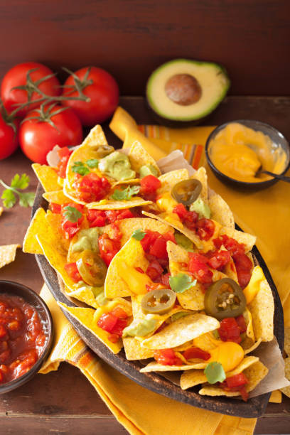 istock nachos loaded with salsa, cheese and jalapeno 929664990
