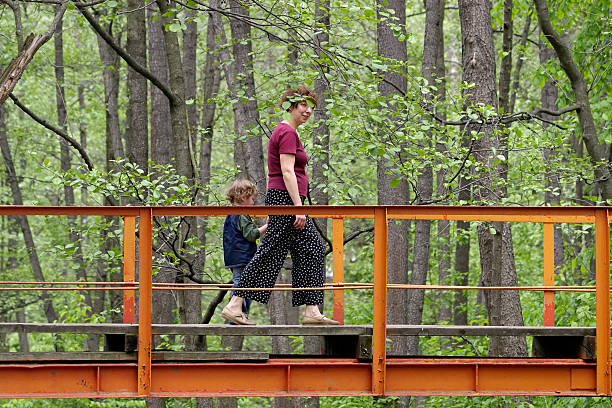 istock Mum and son on the bridge 92966554