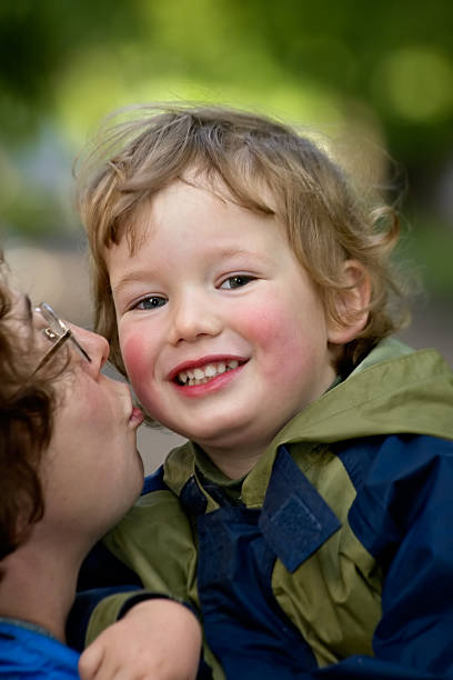 istock Mum kisses the boy 92966556