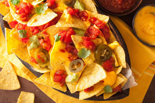 istock nachos loaded with salsa, cheese and jalapeno 929667204