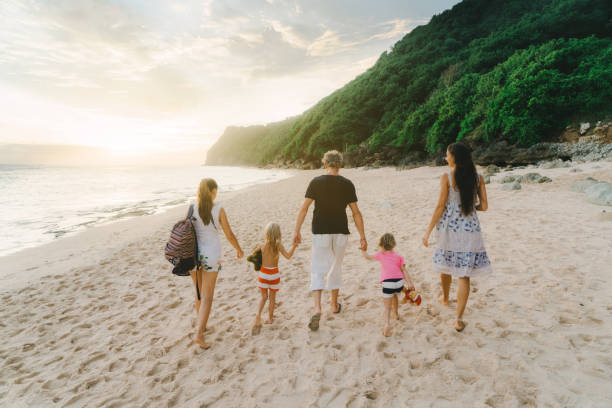 istock Family  walking on the beach in Bali 929671630