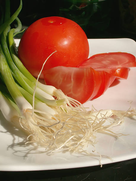 chive and tomato stock photo
