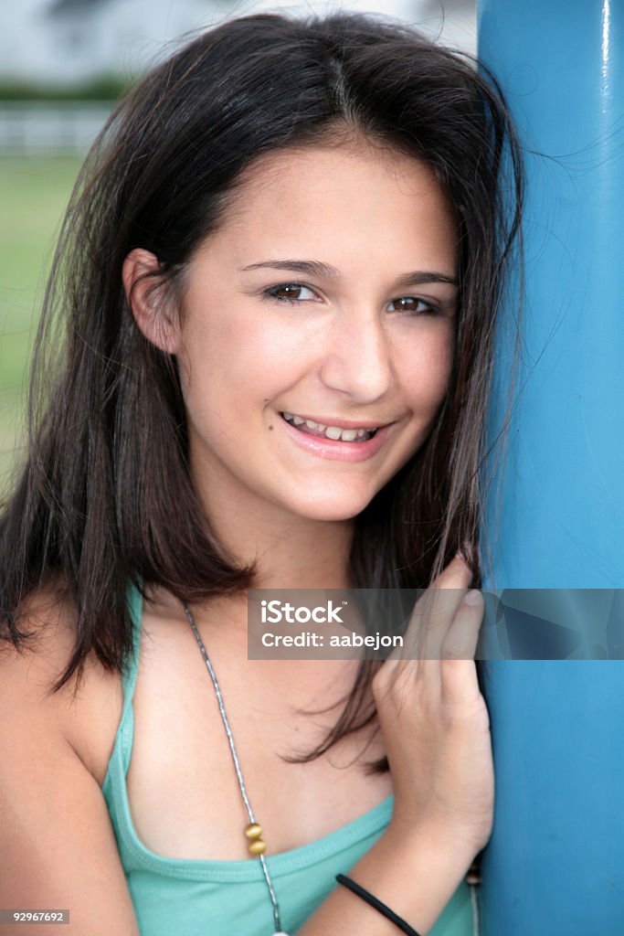 Coy Little Smile  Adolescence Stock Photo