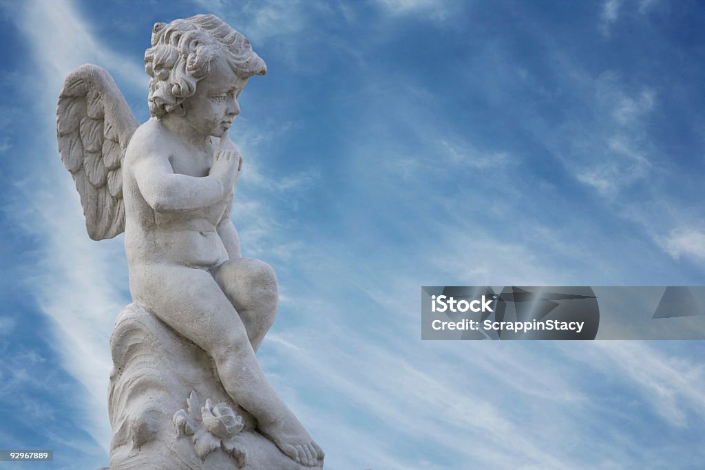 Boy with wings Winged boy statue Abstract Stock Photo