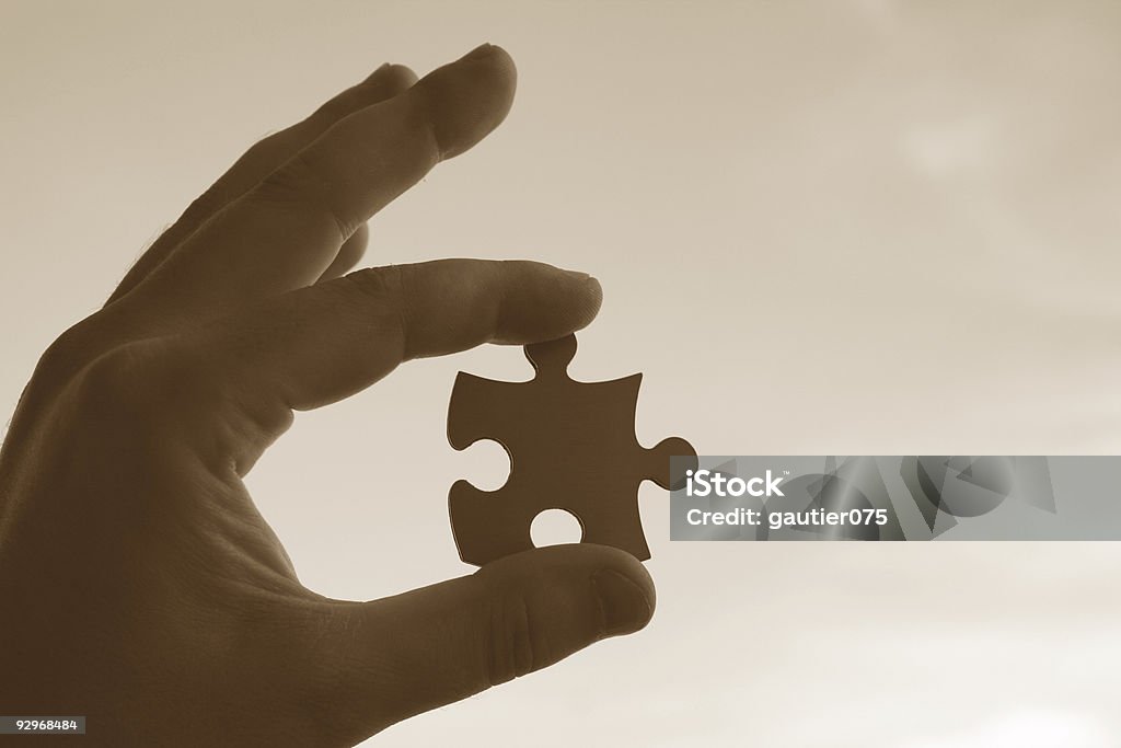 Puzzle in mano - Foto stock royalty-free di Fallimento