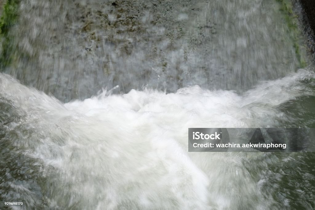 abstract water flows from the pipe background Abstract Stock Photo