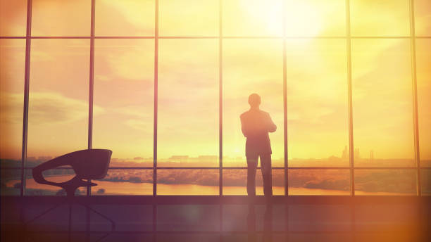 istock Men in the huge office in front of large windows 929719746