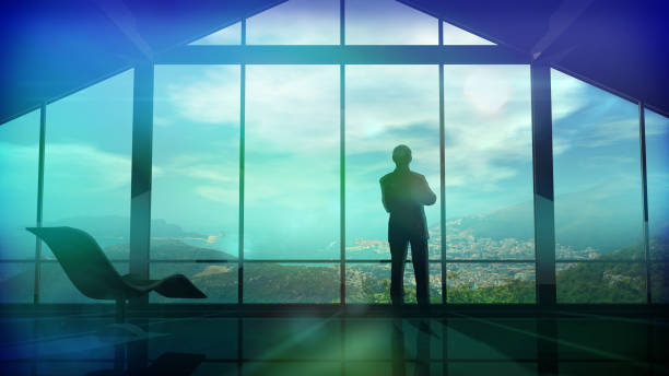 istock Men in the huge office in front of large windows 929719942