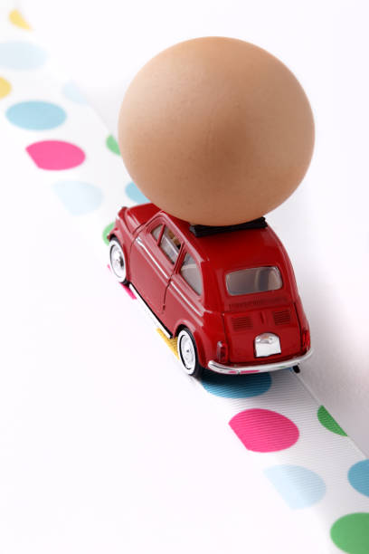 istock Egg symbol of Easter, comes by car 929720158