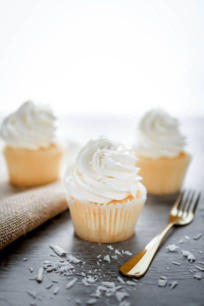 istock Vanilla cupcakes frosting with butter cream. 929720316
