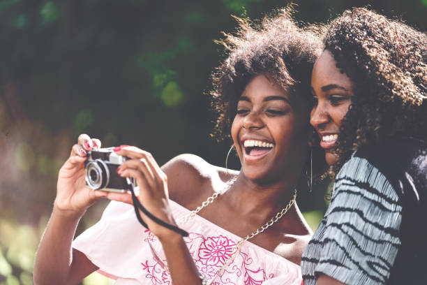 istock Friends Having Fun with Analogue/Retro Camera 929720700