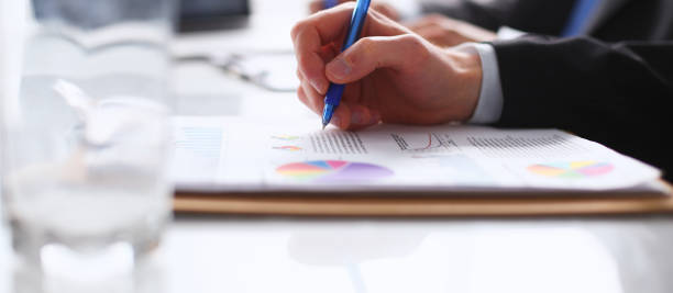 istock Businesspeople sitting on the desk on office 929720736