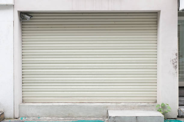 istock sidewalk by street wall & door 929723074