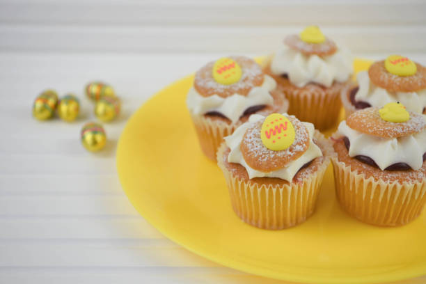 istock plate of homemade mini easter cream cakes on white 929723126