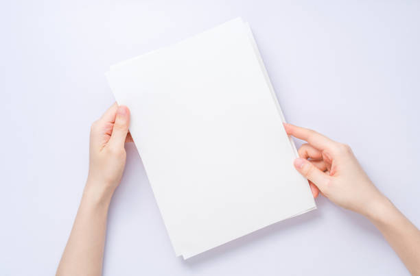 istock girl hands holding paper 929723234