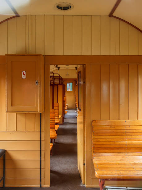 istock Old train carriage with wooden benches in third class 929724762