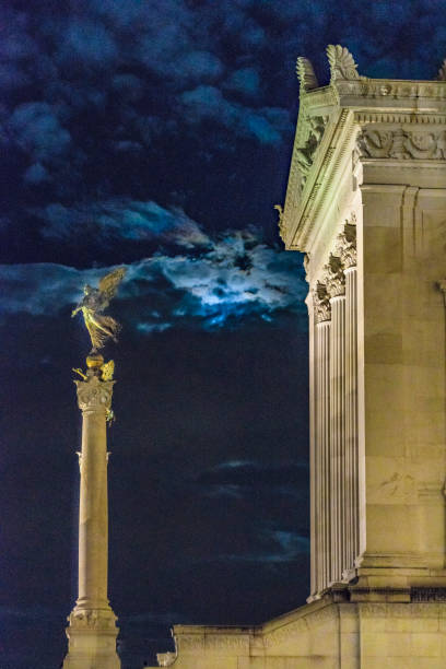 Exterior night scene sculpture at Vittorio Emanuele II monument conmemoraty building located in center of Rome, Italy