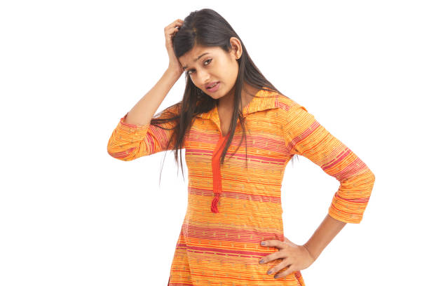 Worried Indian young women on white.
