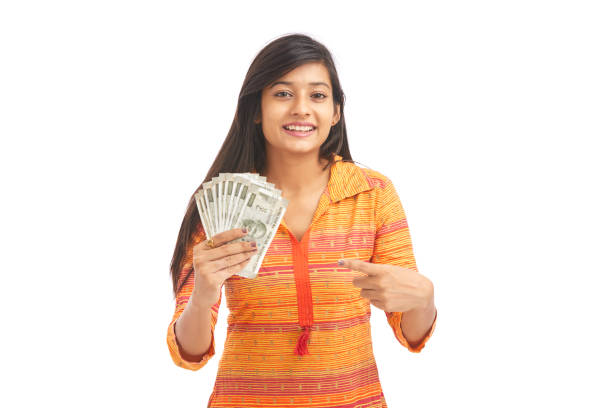 istock Young happy woman holding 500 rupee notes 929731200