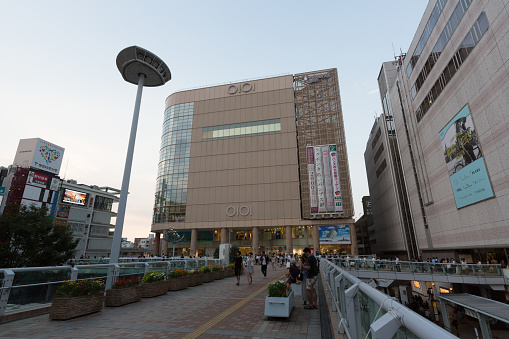 Tokyo, Japan - August 14, 2016 : People walk past the Kita-Senju Marui department store in Adachi, Tokyo, Japan.