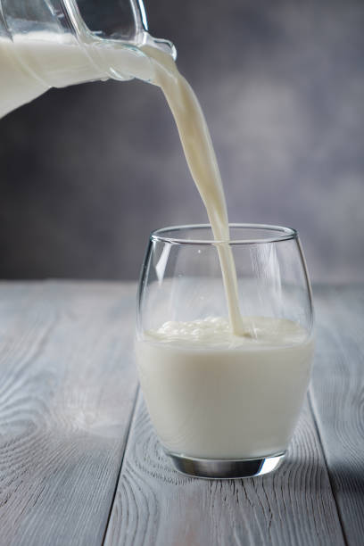 istock Pouring milk into glass 929732042
