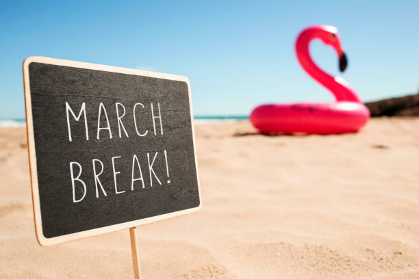 istock text march break in a signboard on the beach 929734324
