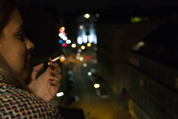 Beautiful woman smoking cigarette