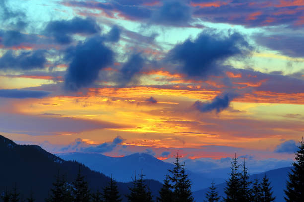 istock very colorful sunset in the mountains 929743688