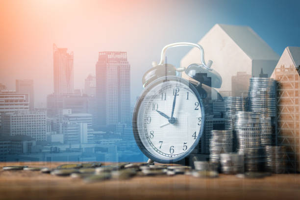 London, UK, September 26, 2009 :  Black and white image of  Time is Money in Canary Wharf which is the largest business development in East London built on the site of the old West India Docks on the Isle Of Dogs