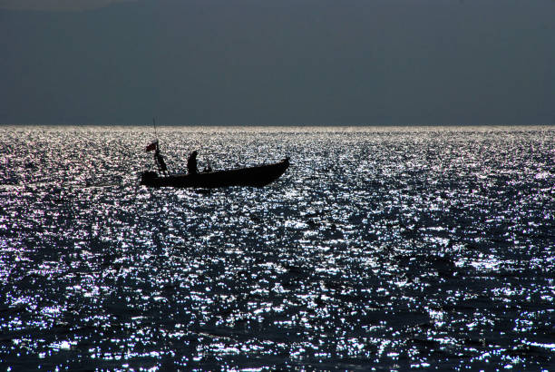 Dinghy Silhouette on the Sea